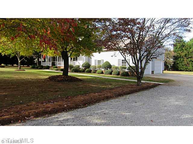5804 Old Oak Ridge Road Greensboro, NC 27410 - Photo 2 of 16 Exterior Front. Double car side loading garage