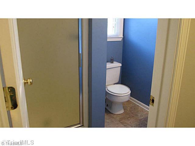 5804 Old Oak Ridge Road Greensboro, NC 27410 - Photo 11 of 16 Bath. Lower level full bath used as powder room for guests
