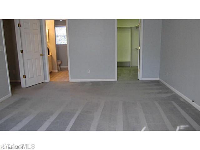 5804 Old Oak Ridge Road Greensboro, NC 27410 - Photo 13 of 16 Master Bedroom. Master bedroom has great walk in closet and plenty of room for King Size bed.