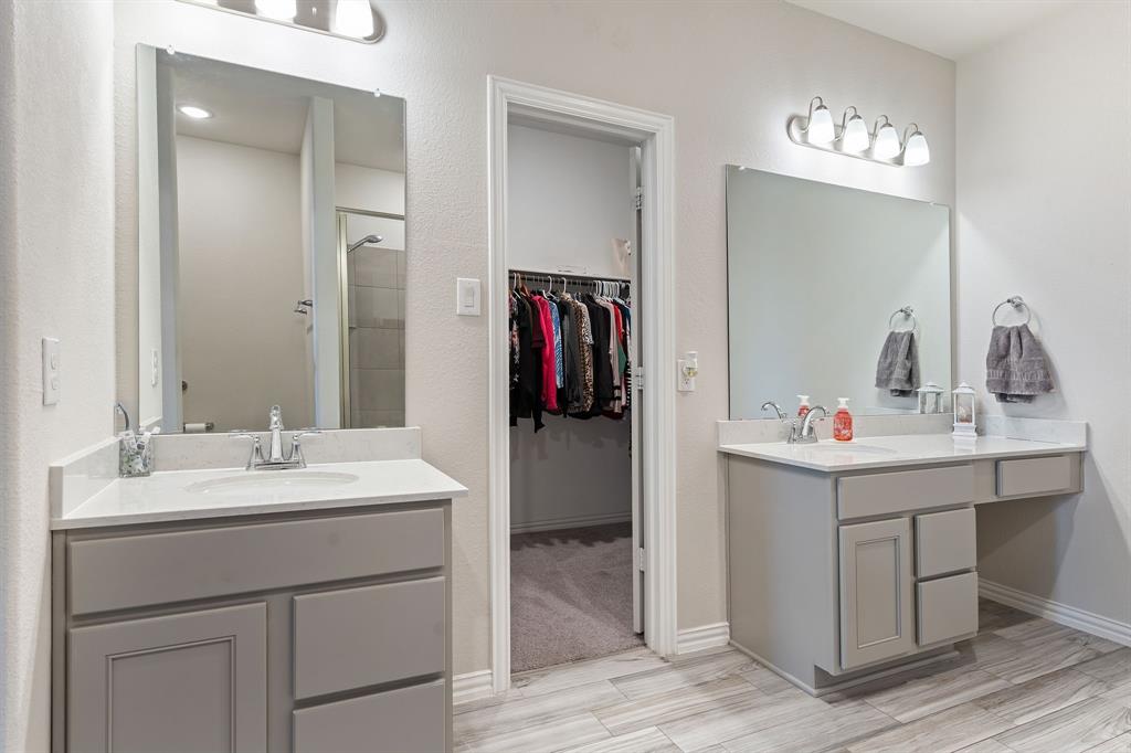 2012 Elara Drive Haslet, TX 76052 - Photo 17 of 34 a bathroom with a sink and a mirror