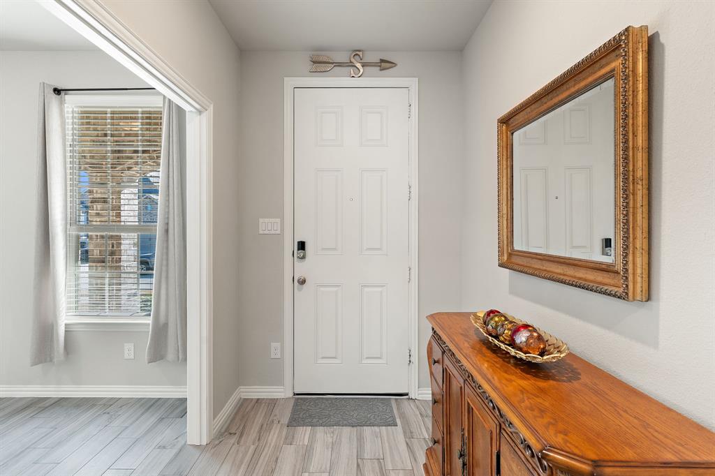 2012 Elara Drive Haslet, TX 76052 - Photo 4 of 34 a room that has a bed and a window in it