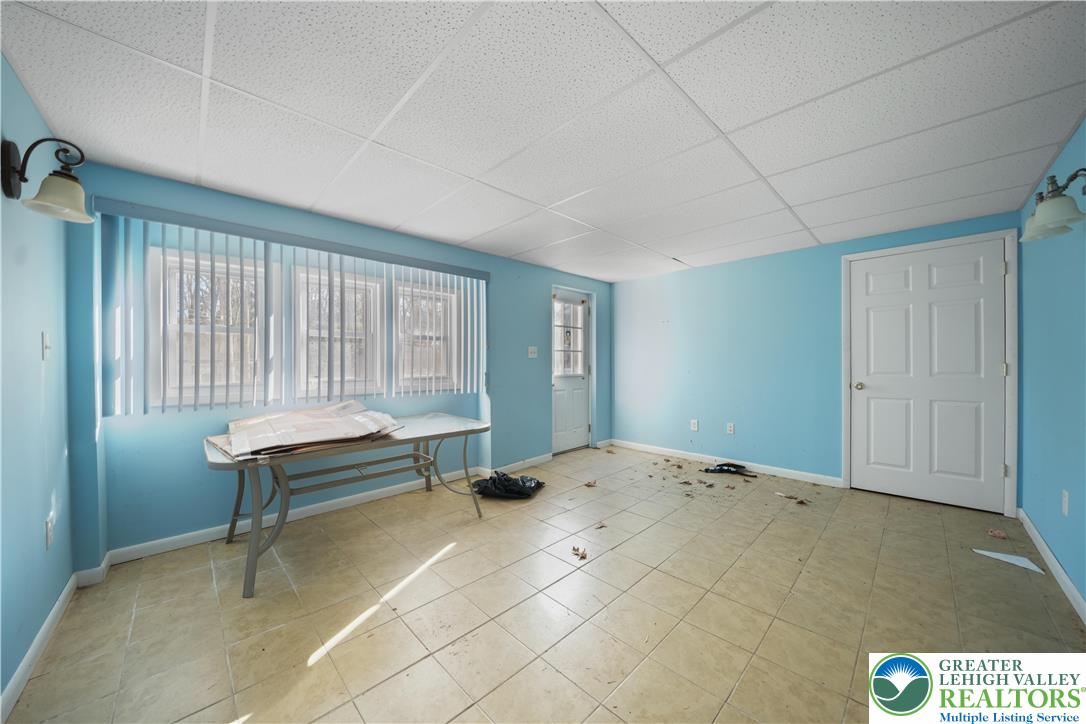 664 Cranberry Road, Unit 1 East Stroudsburg, PA 18301 - Photo 19 of 22 a view of an empty room with a window