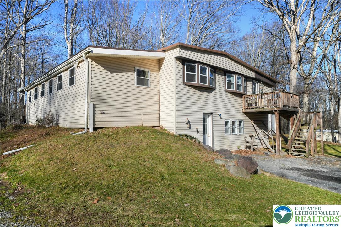 664 Cranberry Road, Unit 1 East Stroudsburg, PA 18301 - Photo 21 of 22 a view of a house with a yard