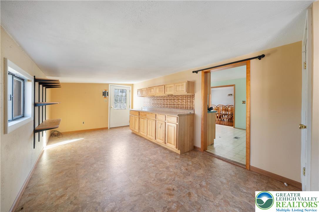 664 Cranberry Road, Unit 1 East Stroudsburg, PA 18301 - Photo 6 of 22 a view of an empty room with a window