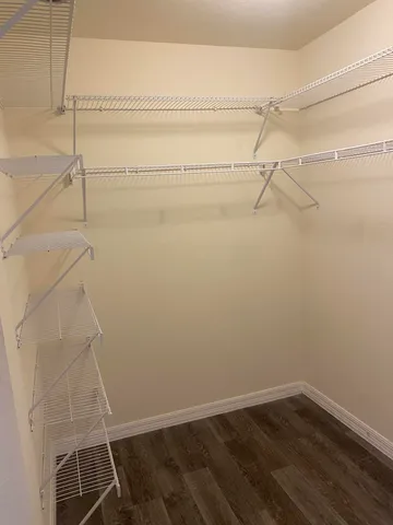 a view of a room with racks on the wall