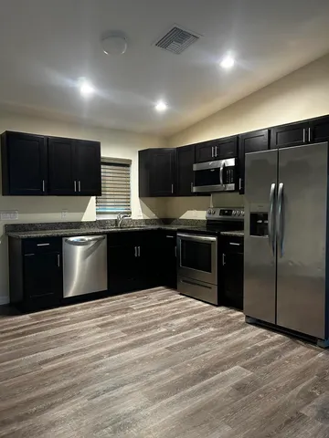 a view of a backyard with a garden