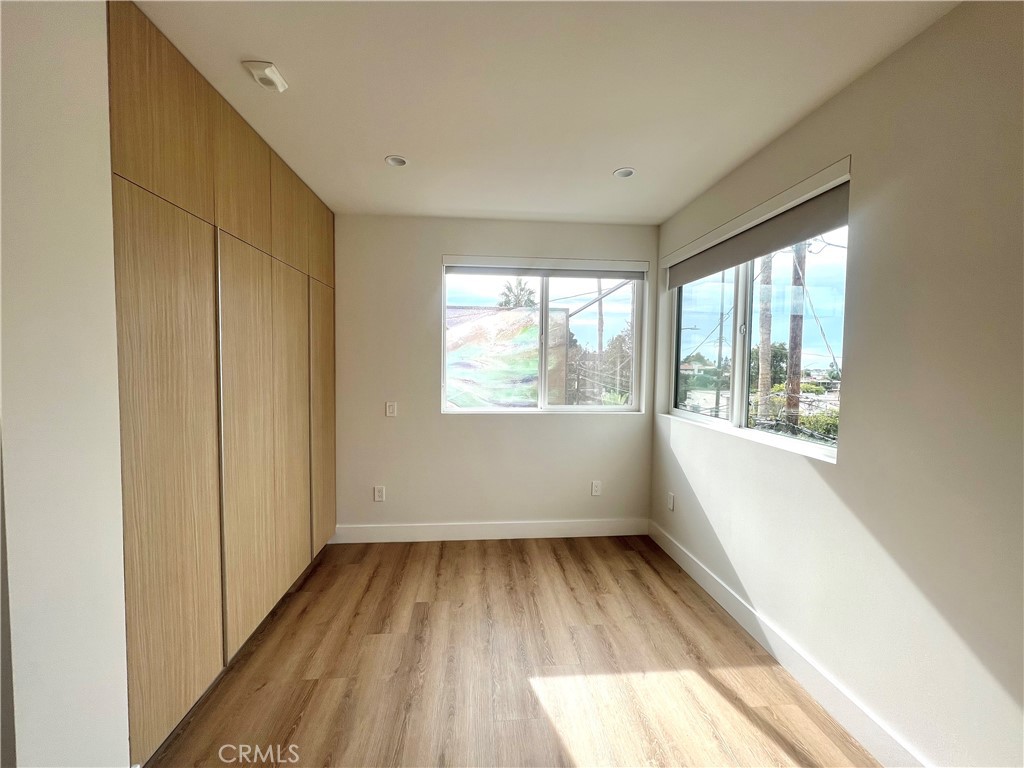 2828 London Street, Unit 304 Los Angeles, CA 90026 - Photo 12 of 23 a view of an empty room with a window