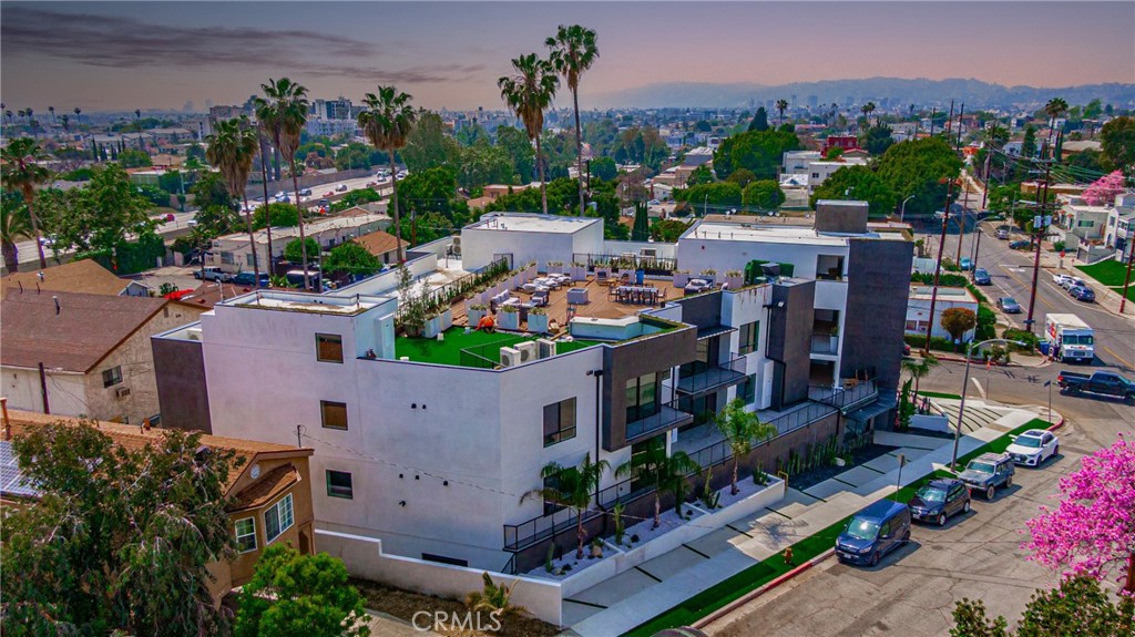 2828 London Street, Unit 304 Los Angeles, CA 90026 - Photo 15 of 23 an aerial view of a house with a garden