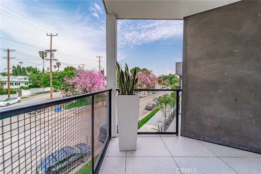 2828 London Street, Unit 304 Los Angeles, CA 90026 - Photo 18 of 23 a view of a balcony with an outdoor space