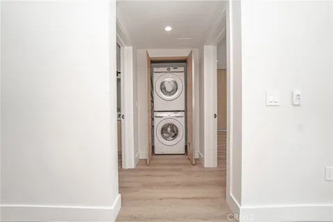 a view of a hallway with door