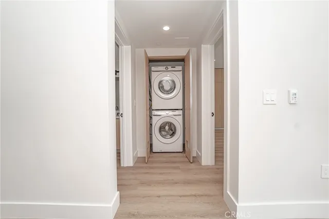 a view of a hallway with door