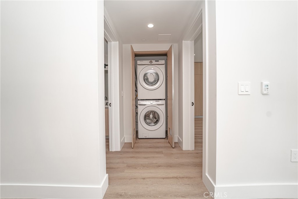 2828 London Street, Unit 304 Los Angeles, CA 90026 - Photo 3 of 23 a view of a hallway with door