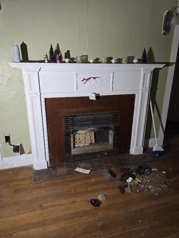 a close view of a fireplace in the room