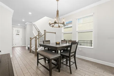 a kitchen with granite countertop a stove sink and cabinets