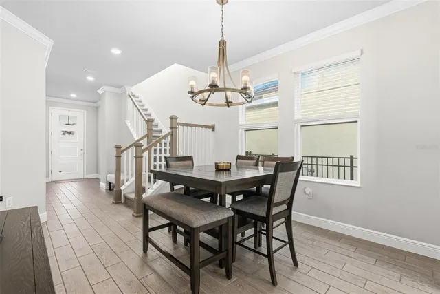 a kitchen with granite countertop a stove sink and cabinets