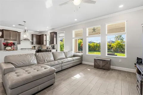 a spacious bedroom with a bed and a large window