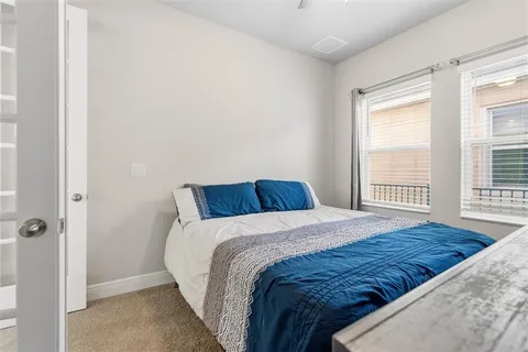 a bathroom with a double vanity sink mirror double and shower