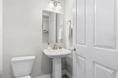 a bed room with furniture and a large window