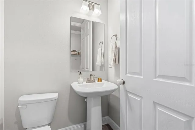 a bed room with furniture and a large window