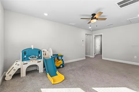 an aerial view of a houses with a outdoor space