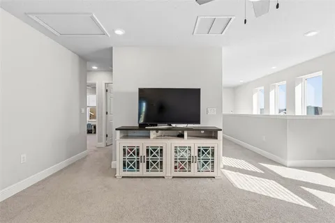 a view of a swimming pool with outdoor seating