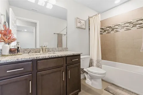 a view of a swimming pool with a yard