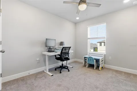 an aerial view of a house with a garden