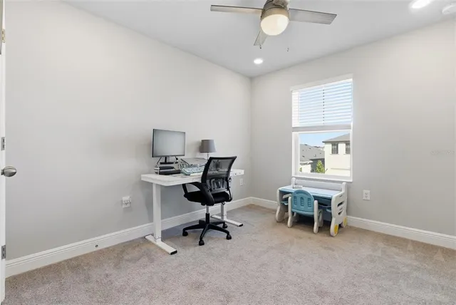 an aerial view of a house with a garden