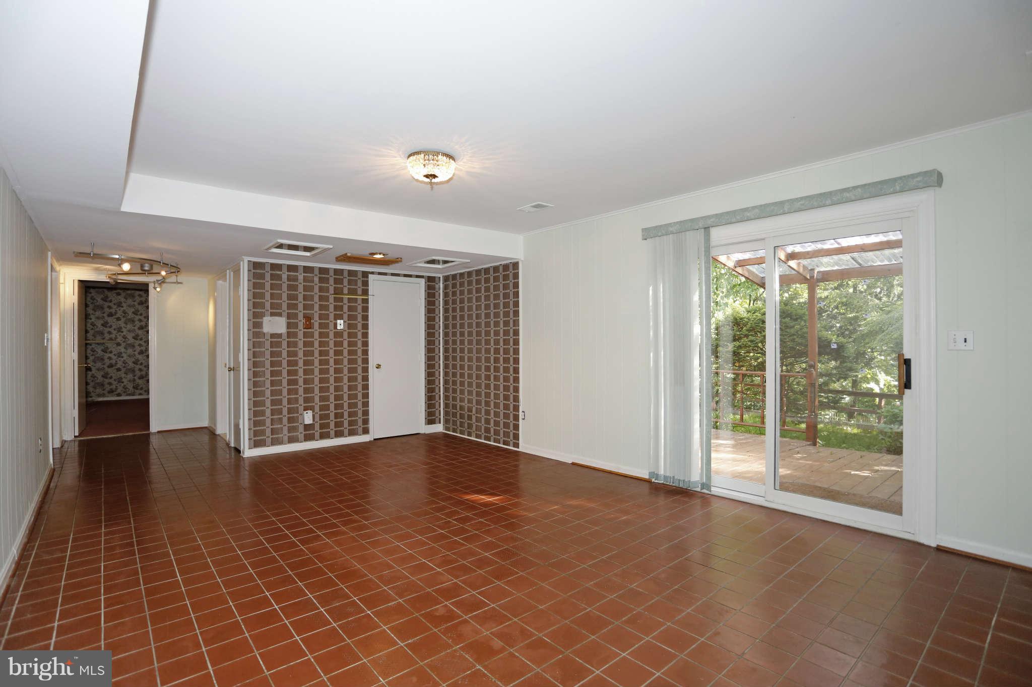 5904 River Road Bethesda, MD 20816 - Photo 18 of 25 Recroom with walk out onto back yard