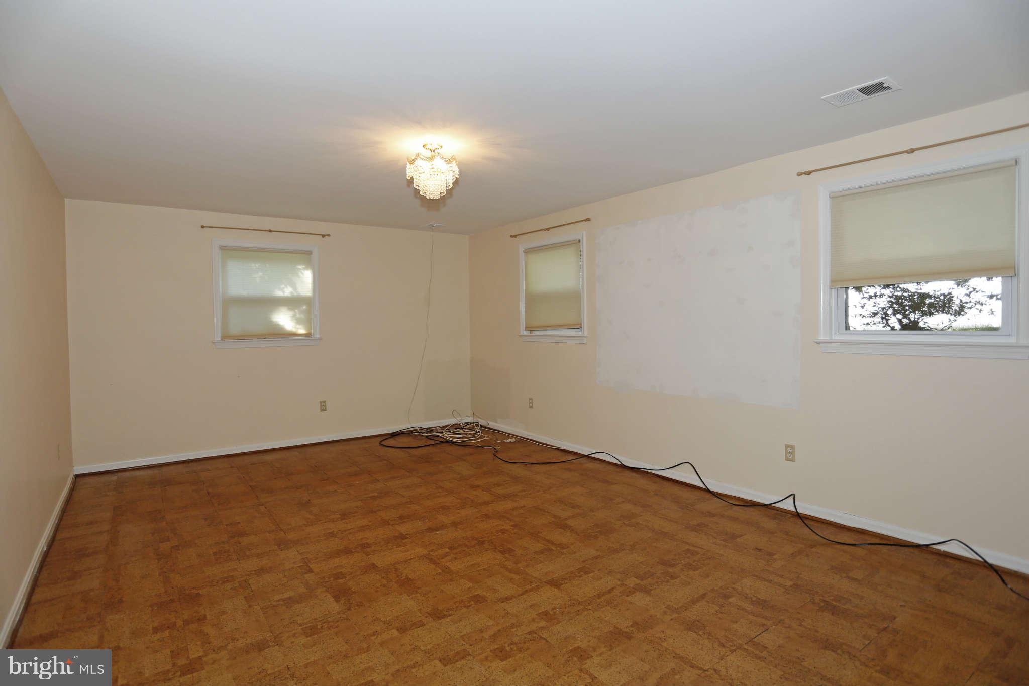 5904 River Road Bethesda, MD 20816 - Photo 19 of 25 Family room on lower level