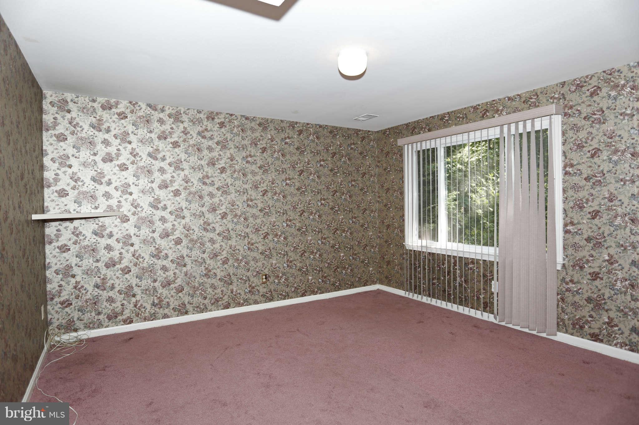 5904 River Road Bethesda, MD 20816 - Photo 20 of 25 Lower level bedroom