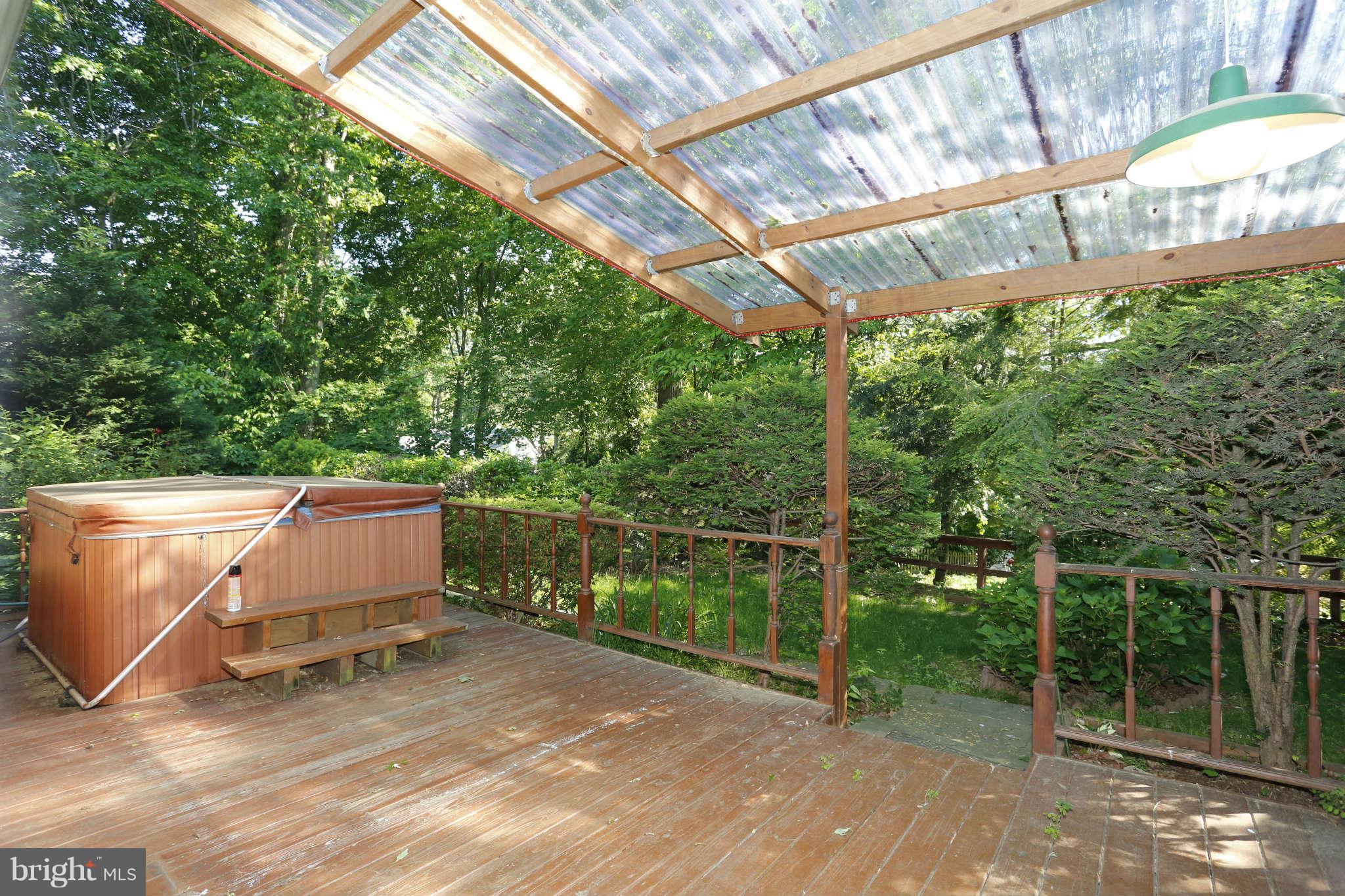 5904 River Road Bethesda, MD 20816 - Photo 24 of 25 Rear ground deck (covered) w/hot tub