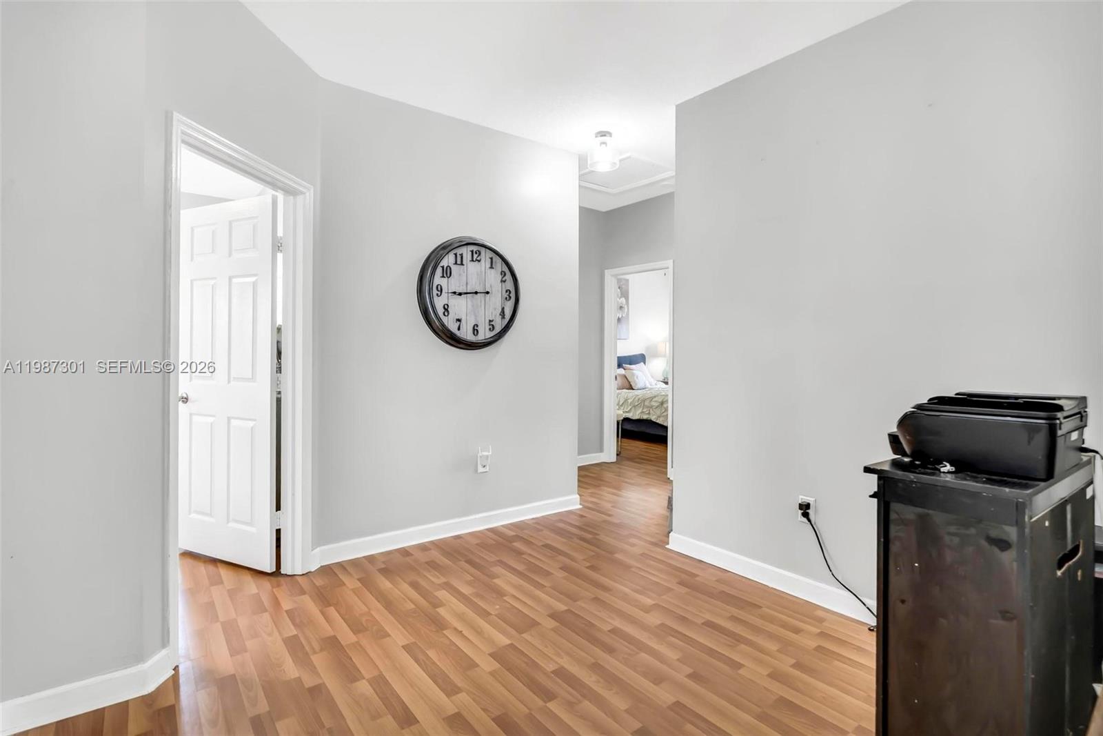 12940 Southwest 142nd Terrace Miami, FL 33186 - Photo 26 of 44 a view of a room with wooden floor