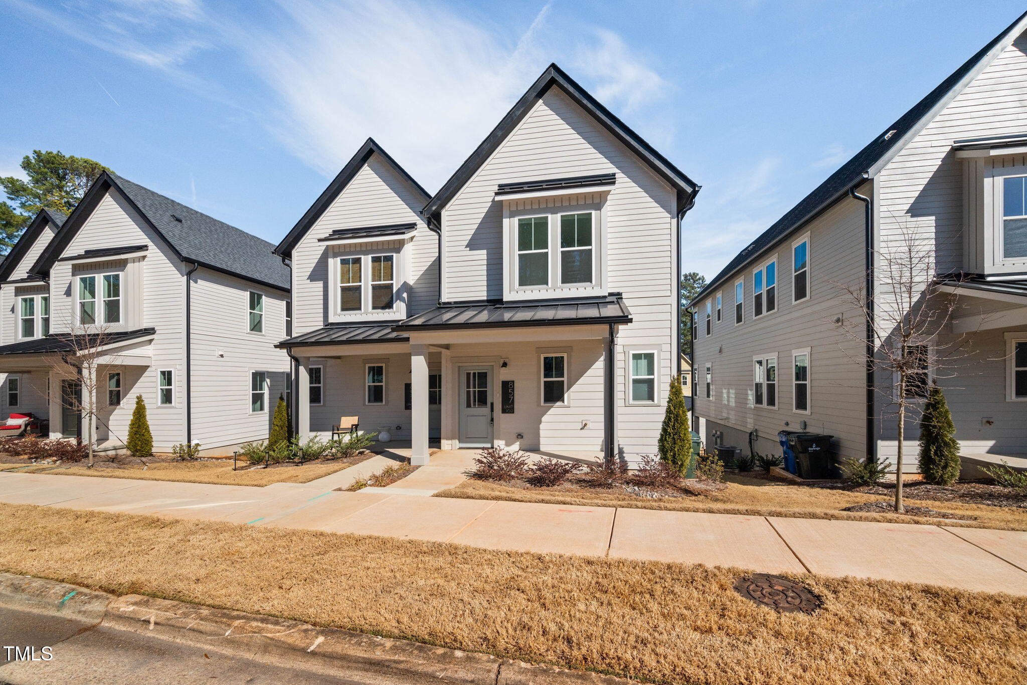 857 Athens Drive, Unit 102 Raleigh, NC 27606 - Photo 3 of 46 Front Exterior