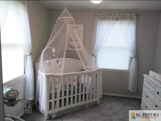 a view of staircase with white walls and stairs