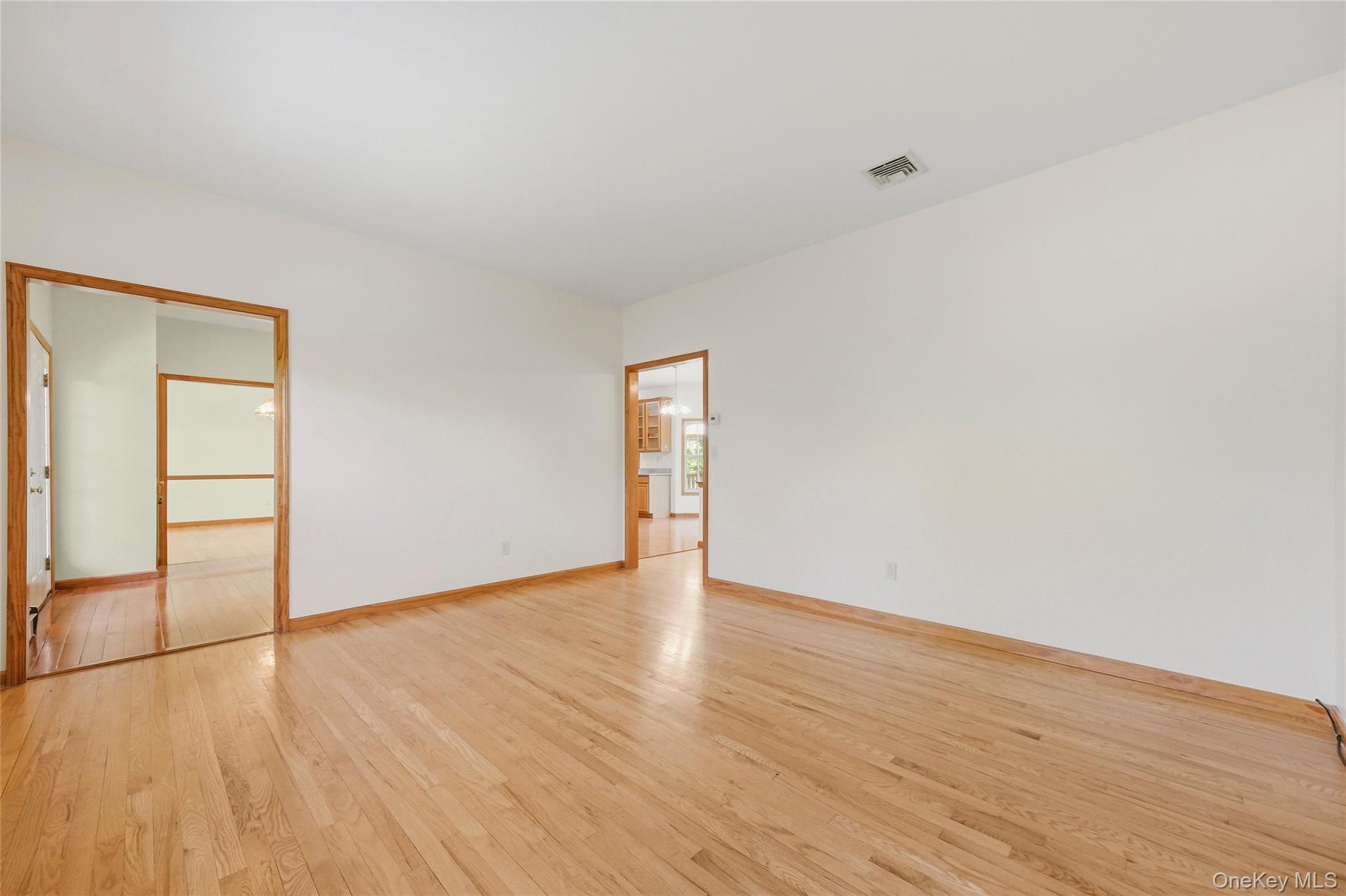 5 Horton Road Washingtonville, NY 10992 - Photo 7 of 42 a view of an empty room with wooden floor and a window