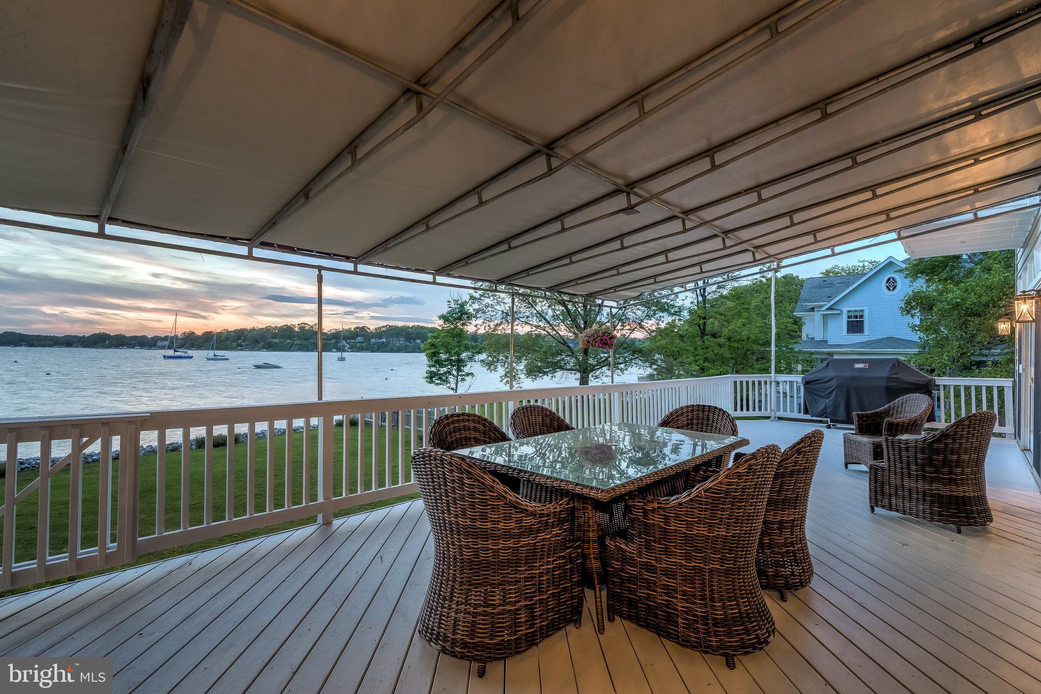 11 Riverview Road Severna Park, MD 21146 - Photo 47 of 61 Dinner on the deck at sunset