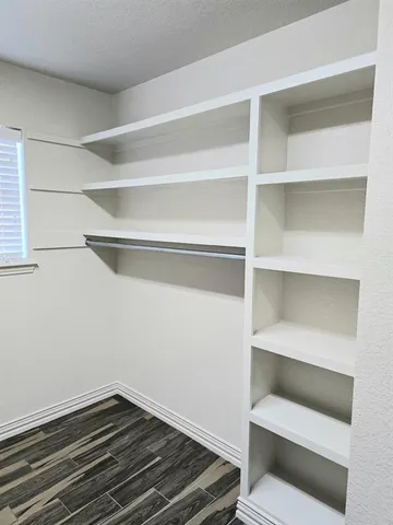 a view of room with walk in closet