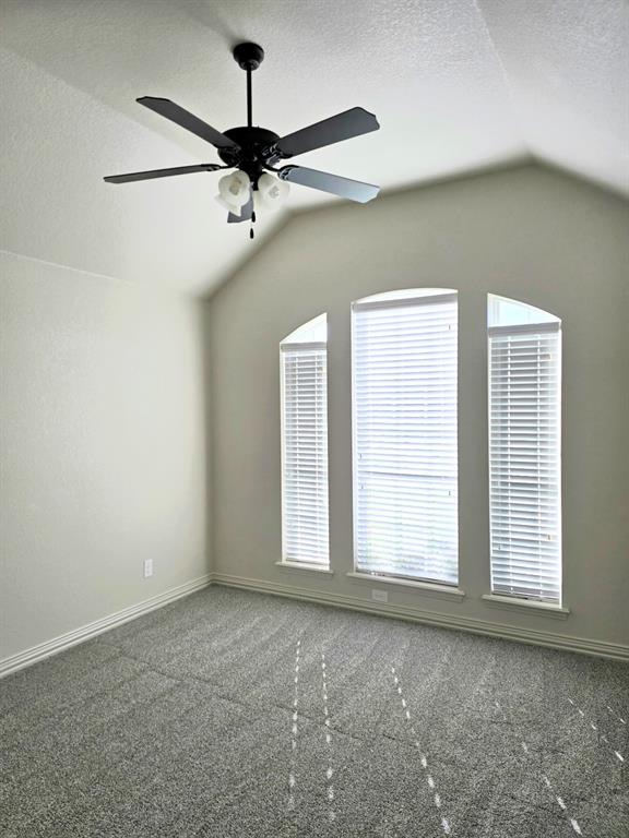 7 Southfork Court Wichita Falls, TX 76310 - Photo 15 of 27 an empty room with windows and fan