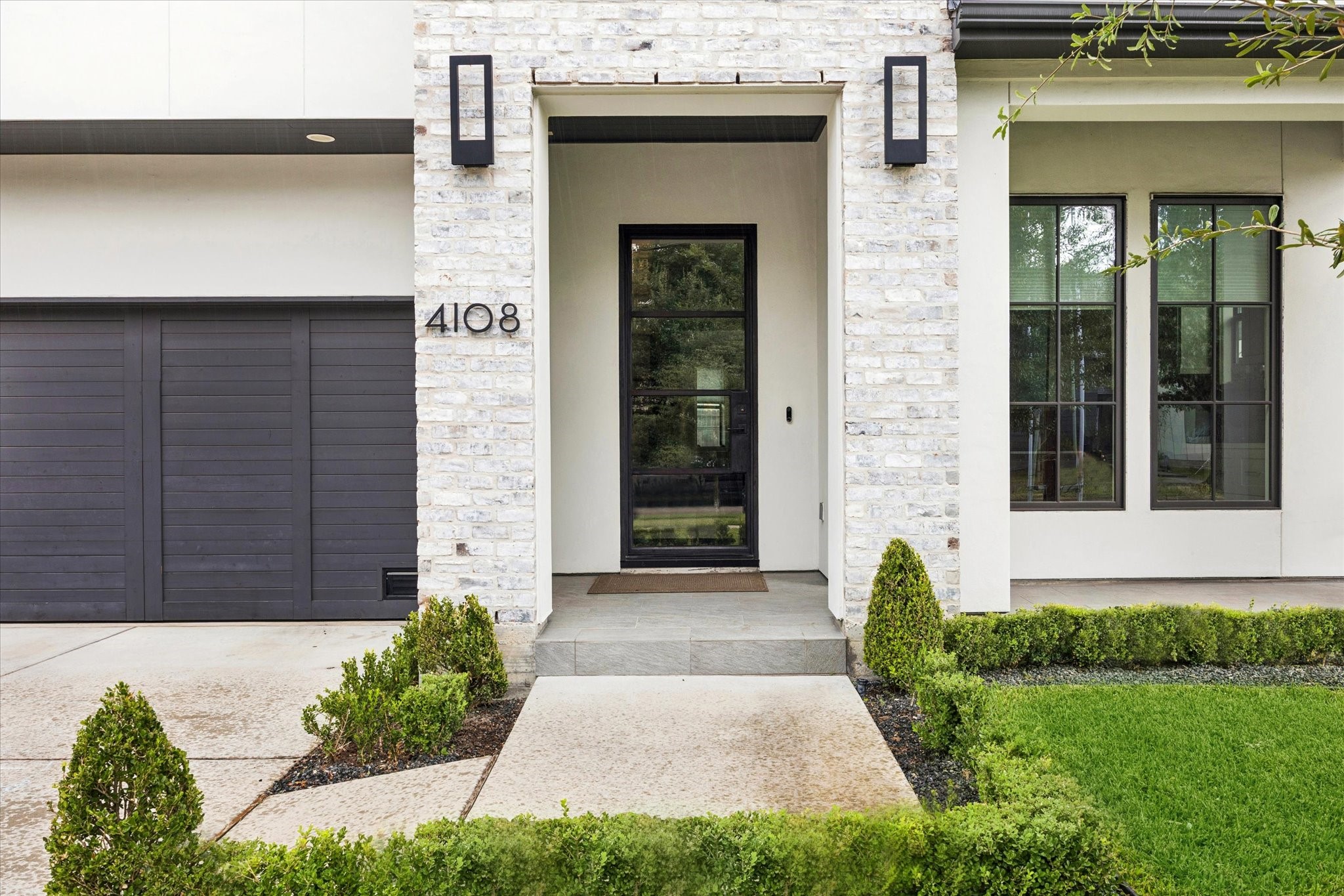 4108 Sunset Boulevard Houston, TX 77005 - Photo 2 of 21 Custom glass and steel front door is an elegant way to flood your entryway with natural light.