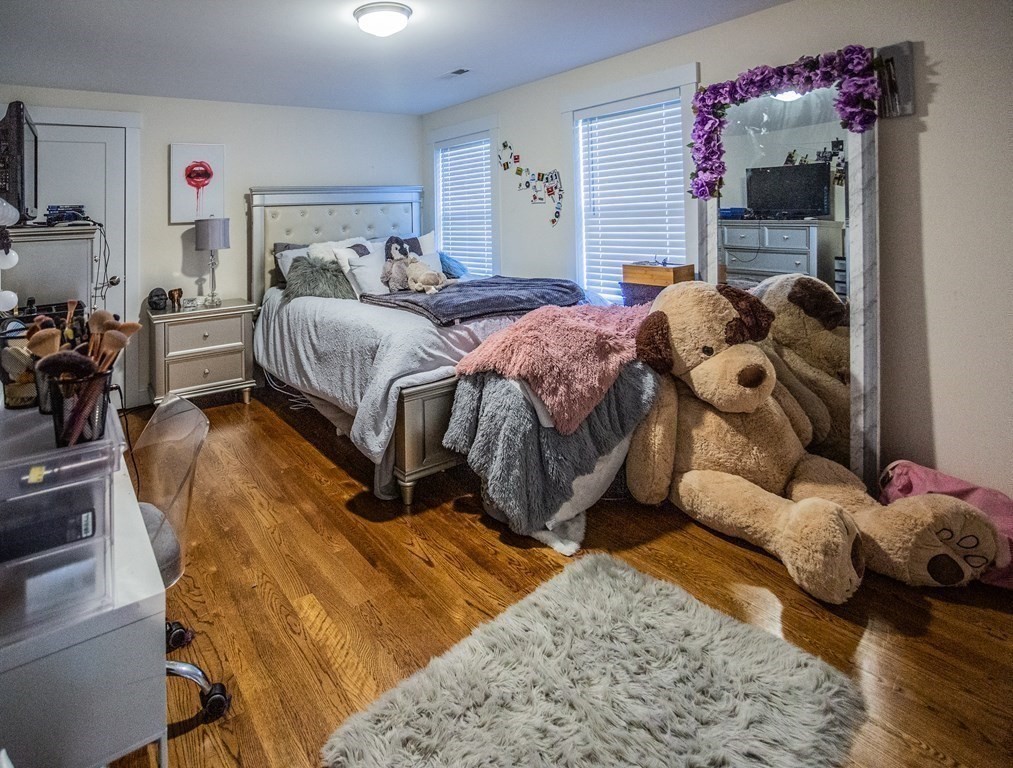 1301 Service Road Barnstable, MA 02668 - Photo 27 of 40 a bedroom with a bed and a window