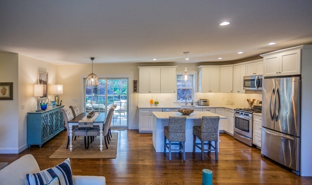1301 Service Road Barnstable, MA 02668 - Photo 4 of 40 a view of kitchen with cabinets table and chairs