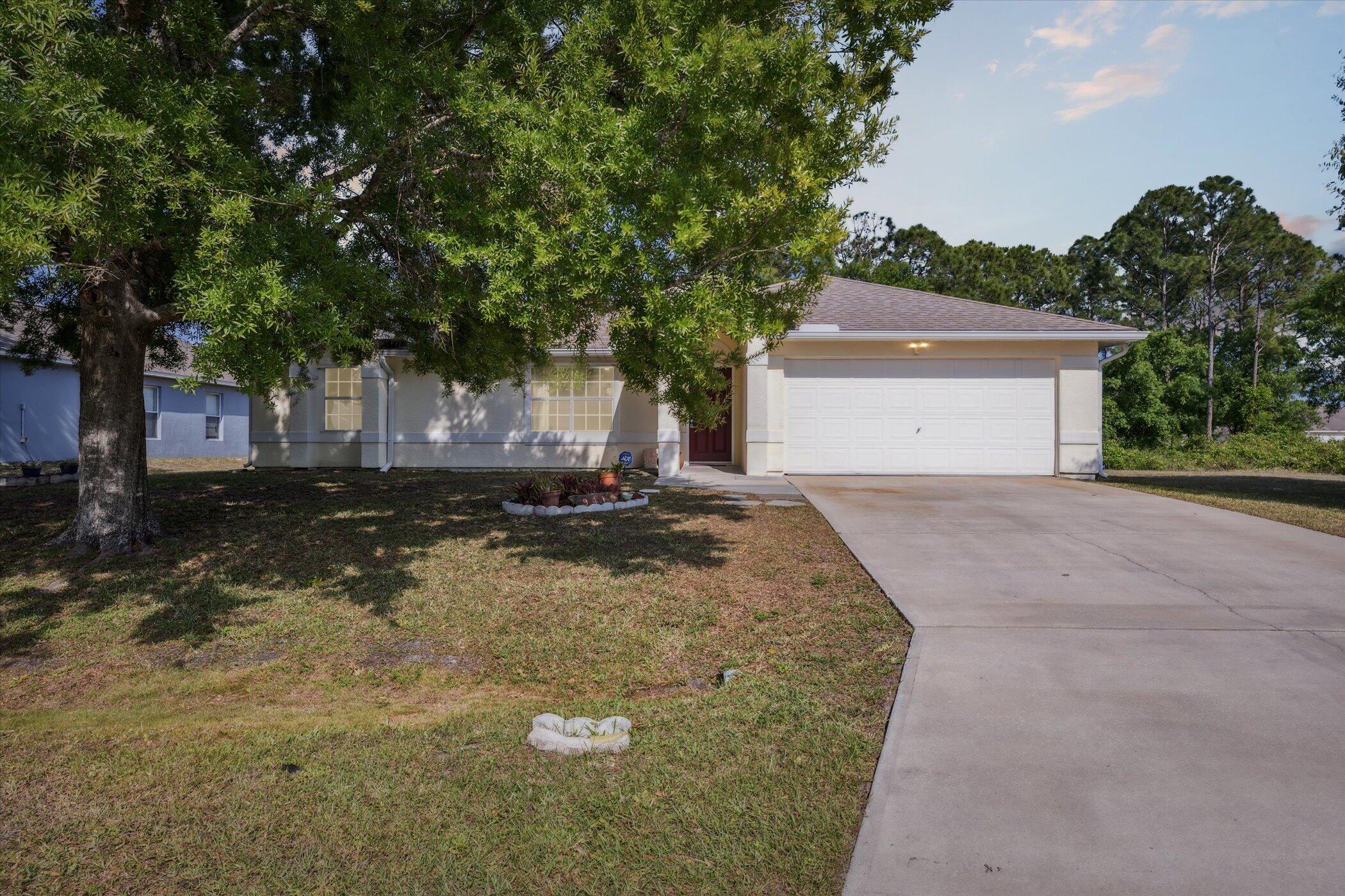 941 Carver Road Southeast Palm Bay, FL 32909 - Photo 2 of 26 01-941-Carver-Rd-SE-Palm-Bay-FL-32909-Wi