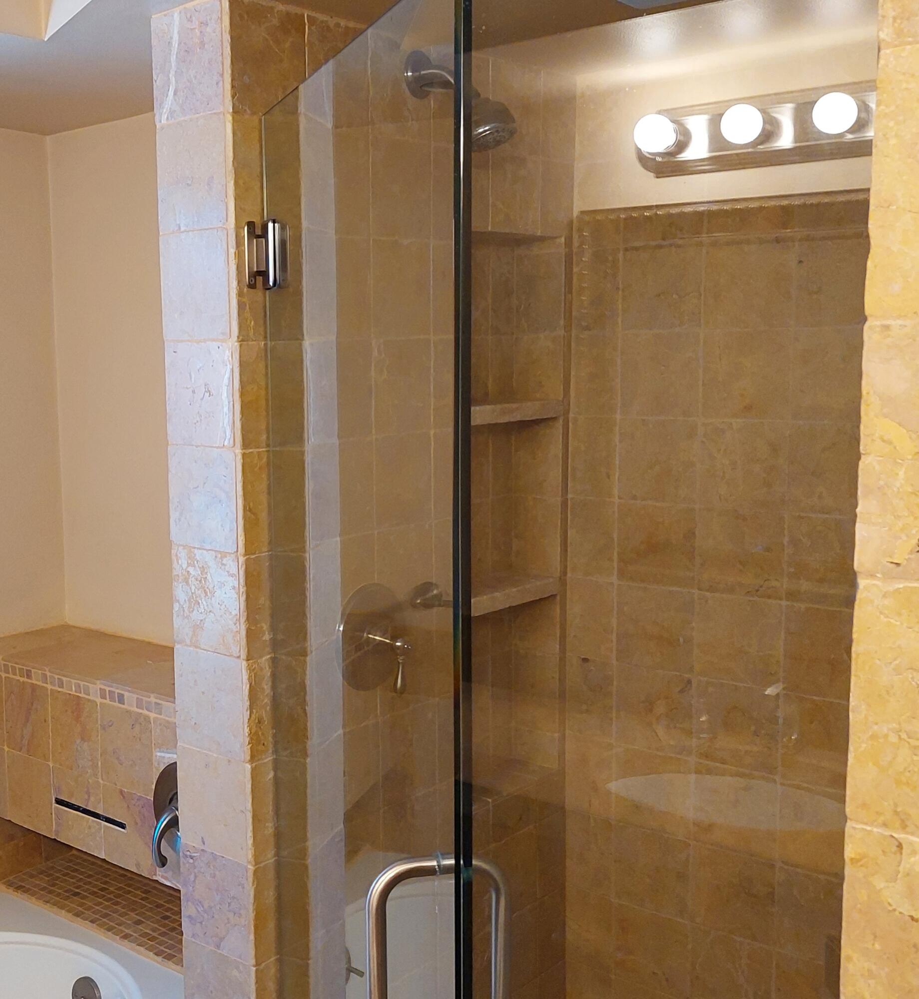42710 Sandy Bay Road Bermuda Dunes, CA 92203 - Photo 18 of 37 a bathroom with a shower