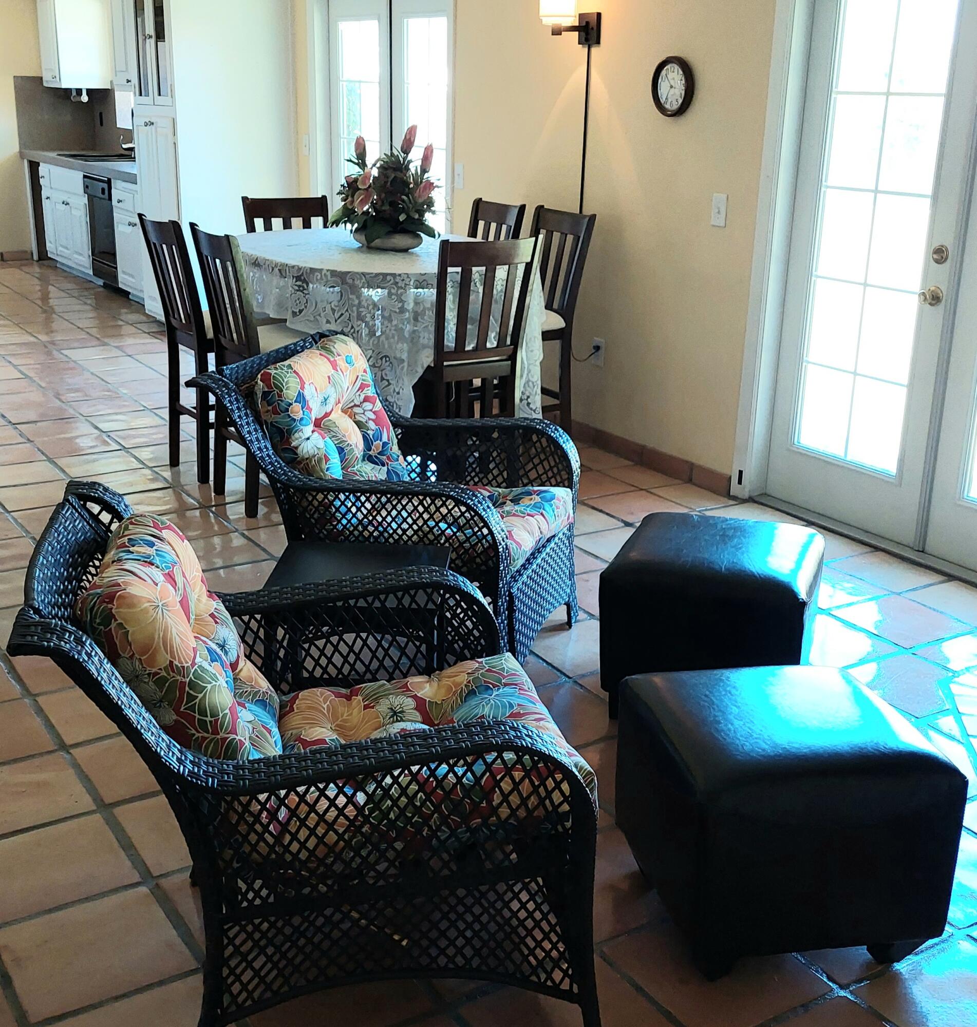 42710 Sandy Bay Road Bermuda Dunes, CA 92203 - Photo 8 of 37 a view of a dining room with furniture and wooden floor
