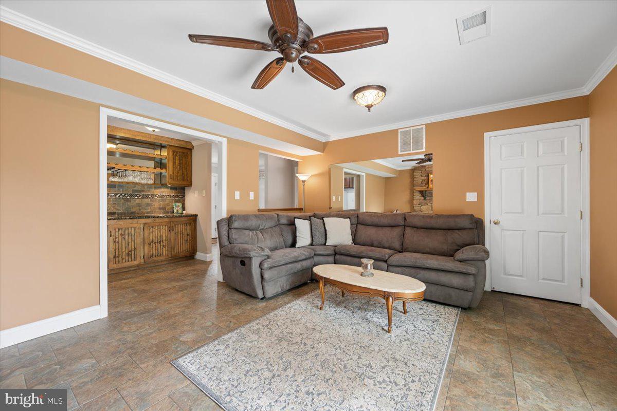 19829 Spurrier Avenue Poolesville, MD 20837 - Photo 29 of 72 Cozy living space with warm tones.