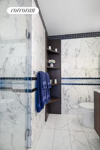 a bathroom with a toilet a sink and a bathtub