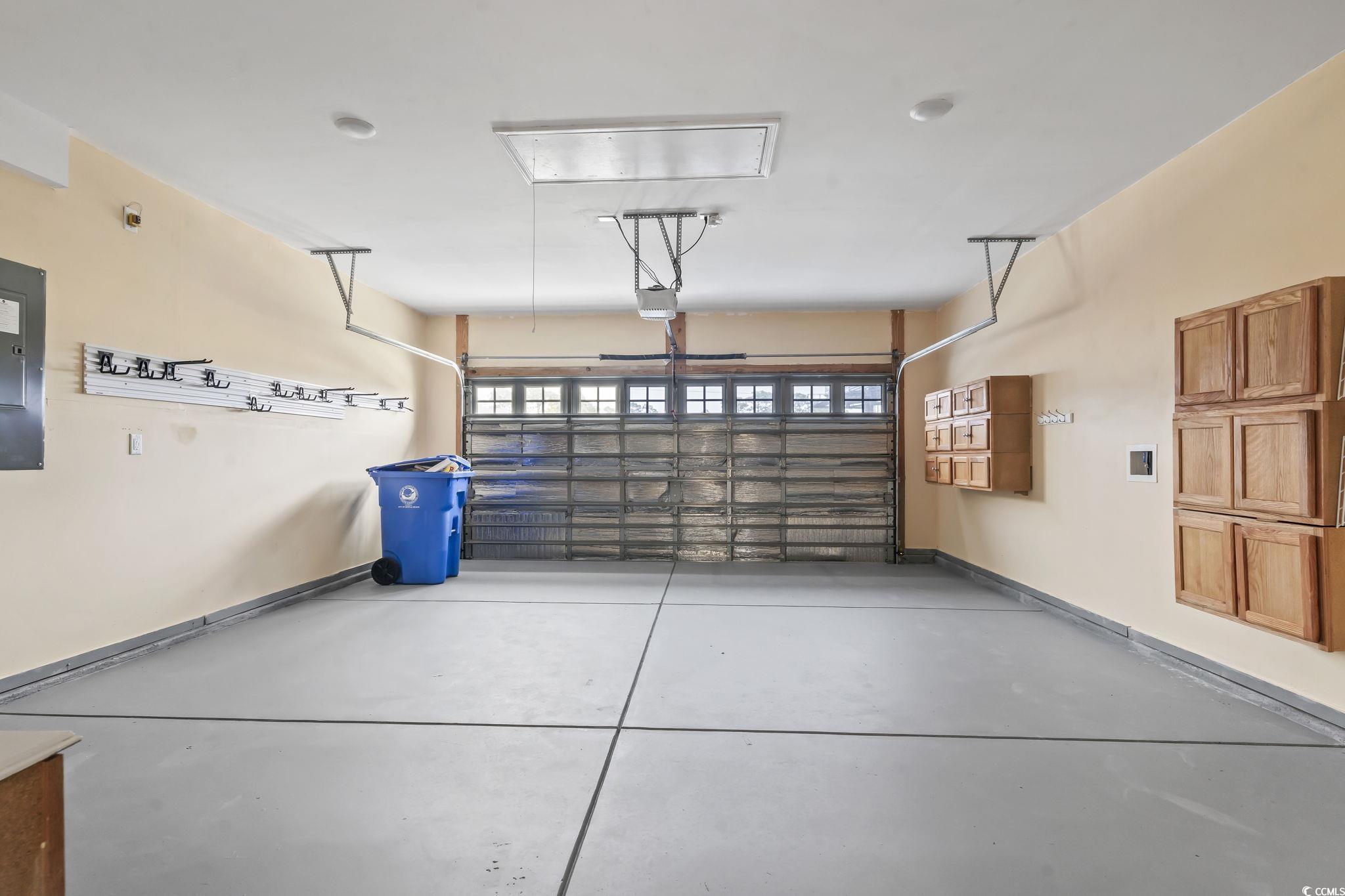 6570 Torino Lane Myrtle Beach, SC 29572 - Photo 15 of 25 Garage with electric panel and baseboards