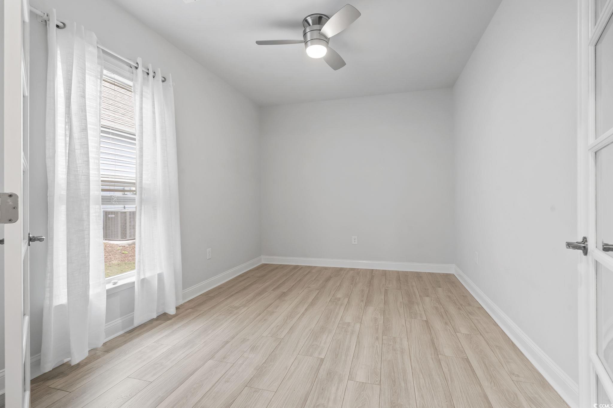 6570 Torino Lane Myrtle Beach, SC 29572 - Photo 16 of 25 Flex room (office or den) with light wood finished floors and ceiling fan