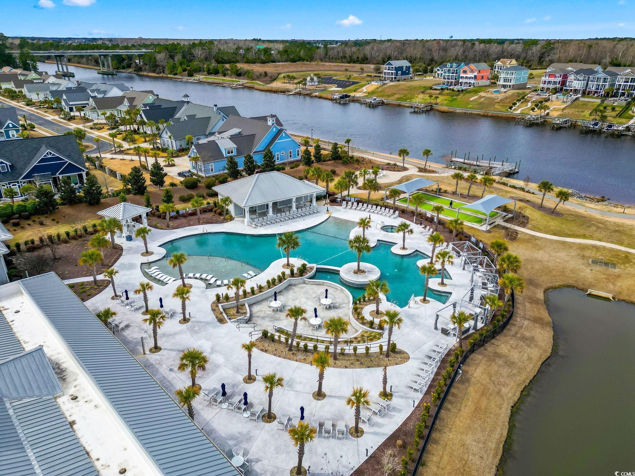 6570 Torino Lane Myrtle Beach, SC 29572 - Photo 21 of 25 Aerial view of pool, tennis courts, clubhouse located on the Intracoastal Waterway